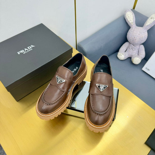 LOAFER WITH TRIANGLE LOGO IN CHOCOLATE BROWN CALFSKIN