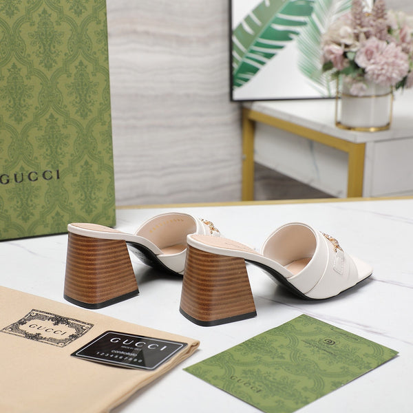 Ciabatte con tacco alto GG bianche