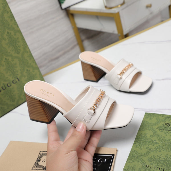 Ciabatte con tacco alto GG bianche