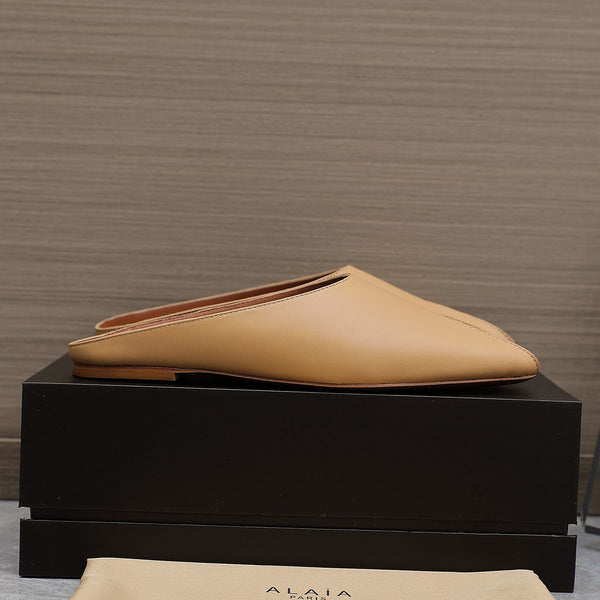ALAIA FLAT MULE IN SEPIA TAN LAMBSKIN