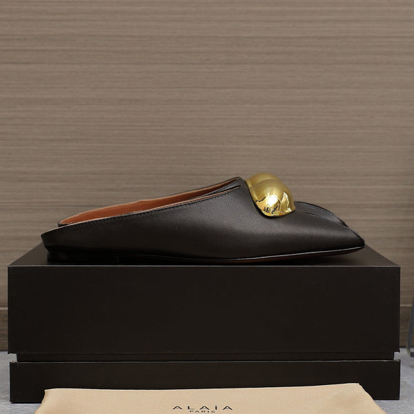 MULE PIATTA ALAIA IN PELLE DI AGNELLO NERA CON FERRAMENTA ORO