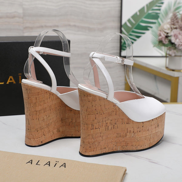 ALAIA WEDGE SANDAL IN WHITE GLOSSY CALFSKIN AND BEIGE RUBBER