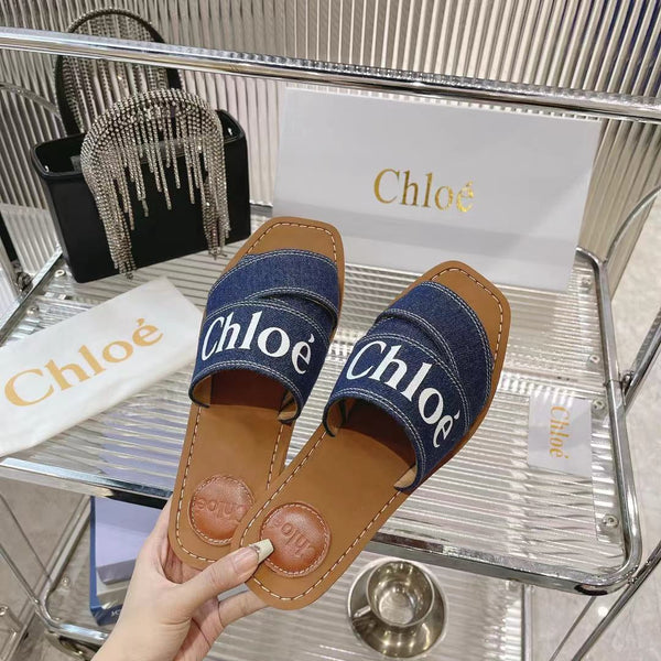 CHLOÉ WOODY MULE IN NAVY BLUE DENIM WITH WHITE LOGO