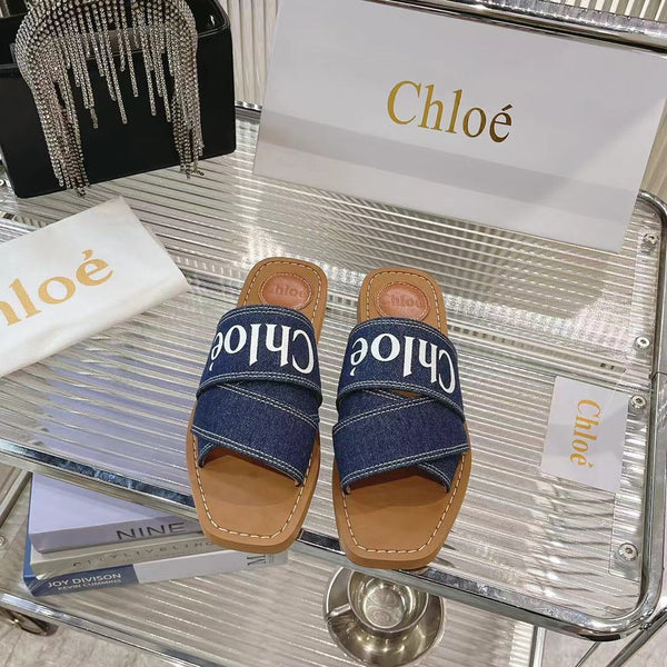 CHLOÉ WOODY MULE IN NAVY BLUE DENIM WITH WHITE LOGO