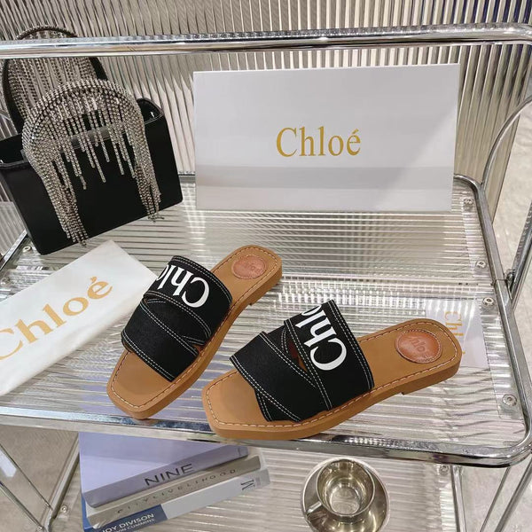 CHLOÉ WOODY MULE IN BLACK DENIM WITH WHITE LOGO