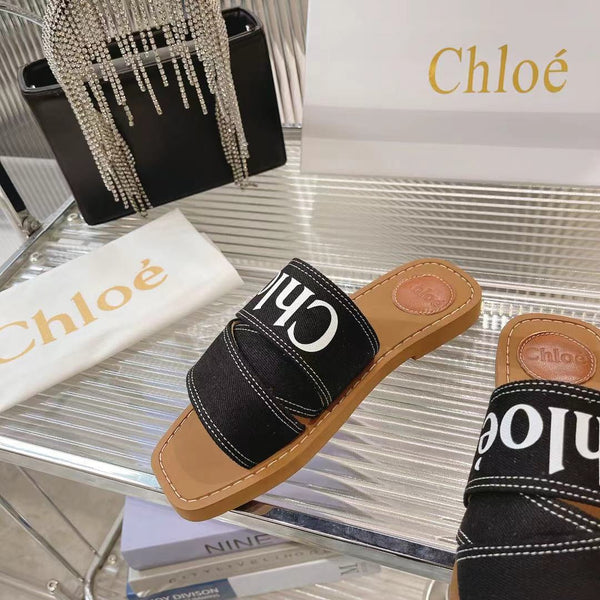 CHLOÉ WOODY MULE IN BLACK DENIM WITH WHITE LOGO