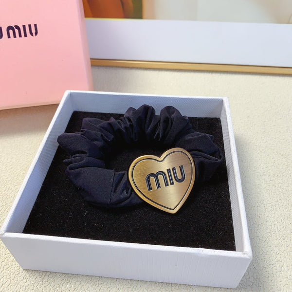 SCRUNCHIE WITH HEART ICON IN BLACK SPANDEX FABRIC 397152