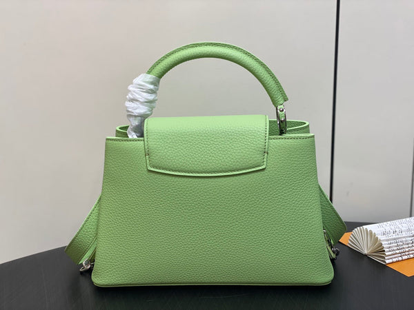 capucines mm 31.5 green taurillon leather turquoise silver hardware