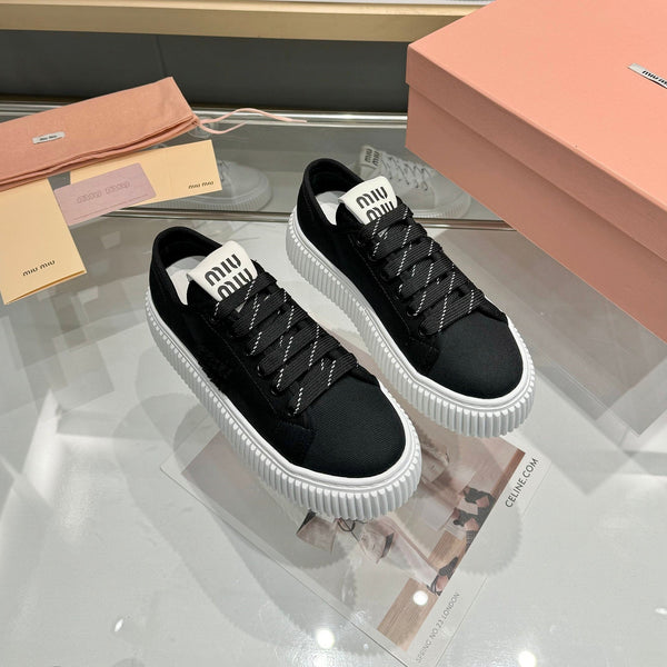 Miu logo-patch sneakers 45mm Black Canvas 456831
