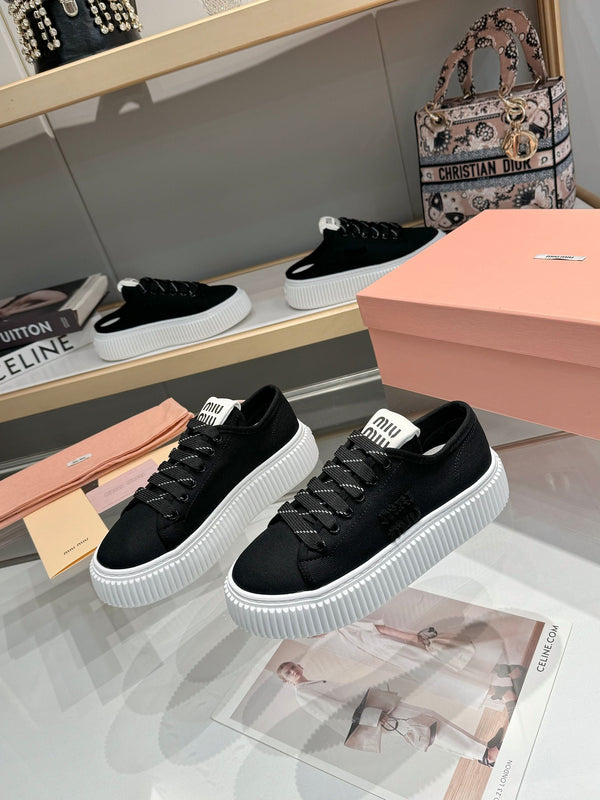 Miu logo-patch sneakers 45mm Black Canvas 456831