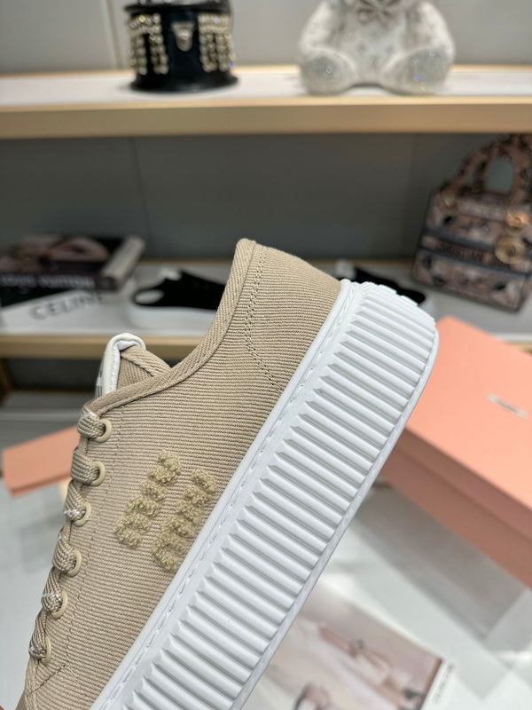Miu logo-patch sneakers 45mm Dark Sand Canvas 456832