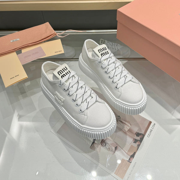 Miu logo-patch sneakers 45mm White Canvas 456833