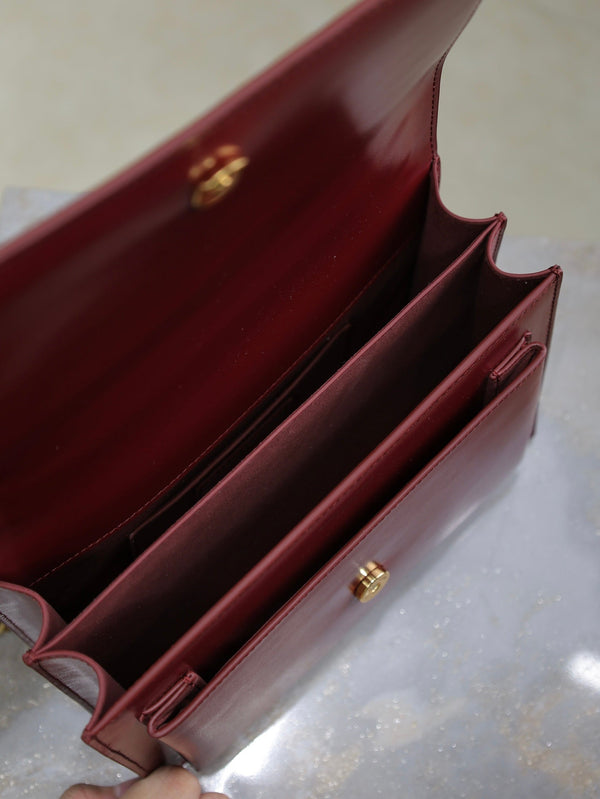 Borsa a tracolla YSL Sunset media 22 cm in pelle di vacchetta bordeaux GHW