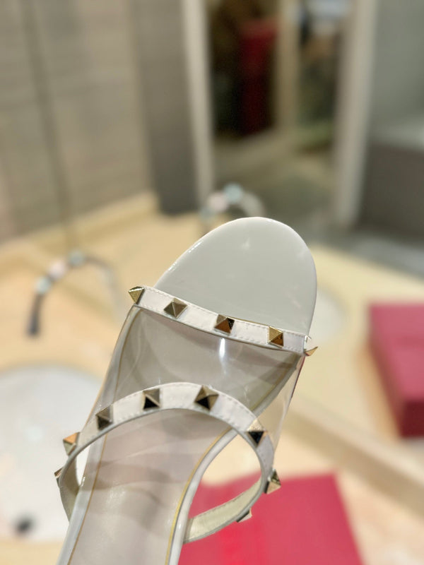 ROCKSTUD MULE SANDALS IN WHITE CALFSKIN AND TRANSPARENT PVC FILM