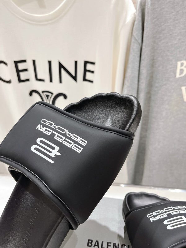 SLIDE SANDALS IN BLACK NYLON AND RUBBER WHITE PRINT