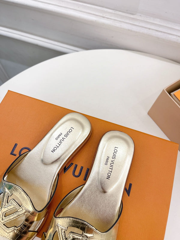 isola flat mule gold metalic calfskin