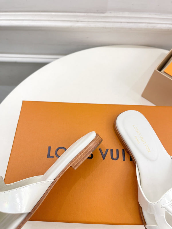 isola flat mule vitello bianco