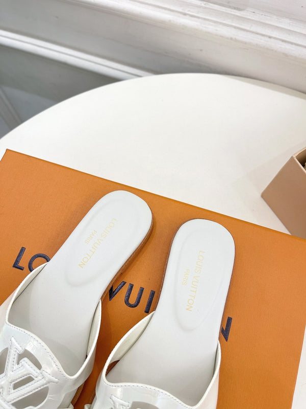 isola flat mule vitello bianco