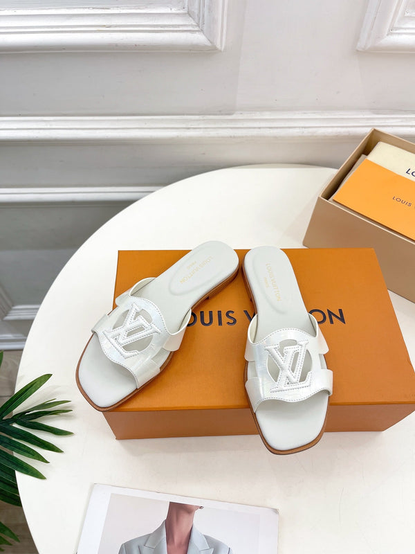 isola flat mule vitello bianco