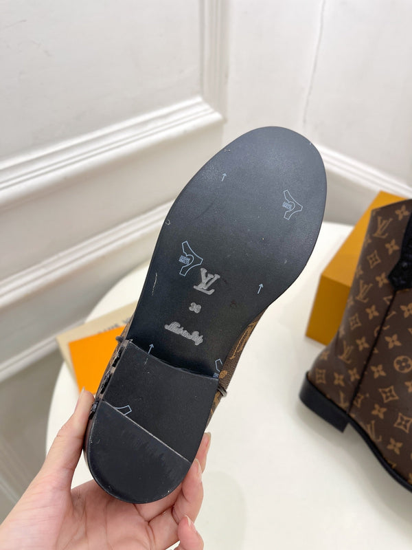 Stivale LV Rider 30mm in pelle di vitello monogramma marrone scuro