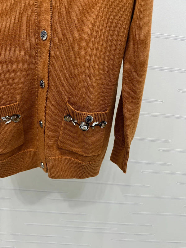 CHANEL HEAVY KNIT CARDIGAN WITH EMBELLISHED FLORAL DETAILS 274877