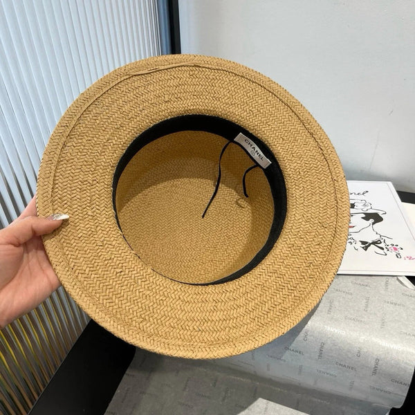 FLAT STRAW HAT BROWN FLOWER ATTACHMENT 673930