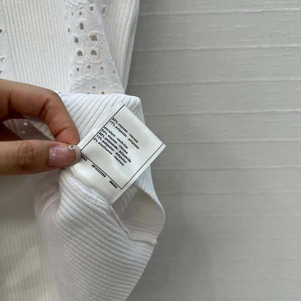 CHANEL SLEEVELESS TOP STYLE 62