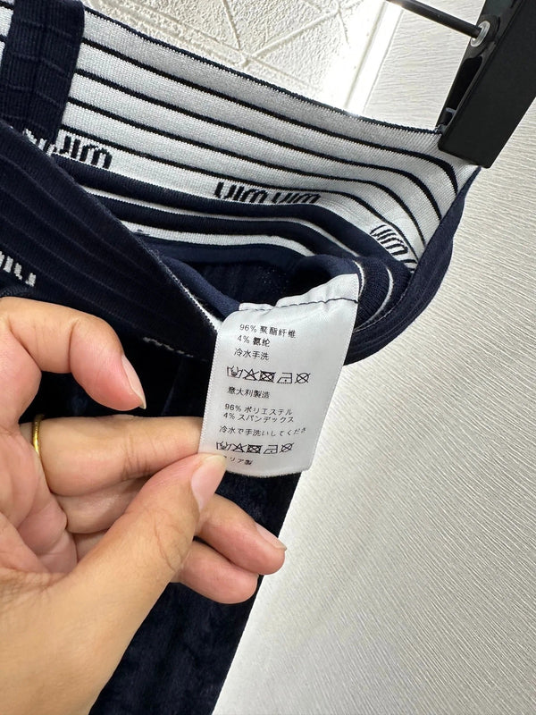 PANTALONI A GAMBA LARGA MIUMIU STILE 118