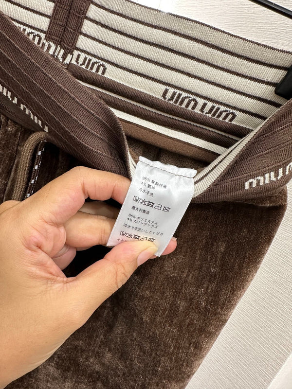 PANTALONI A GAMBA LARGA MIUMIU STILE 119