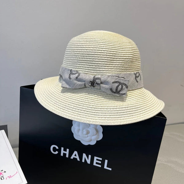 STRAW BUCKET HAT IN IVORY WITH RIBBON BOW 673977