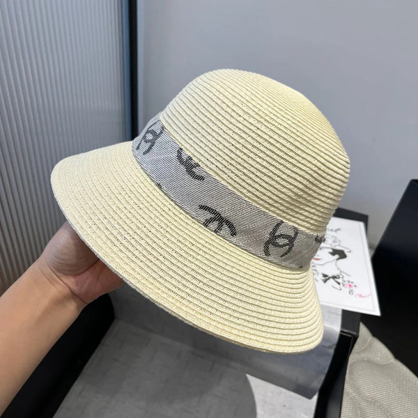 STRAW BUCKET HAT IN IVORY WITH RIBBON BOW 673977