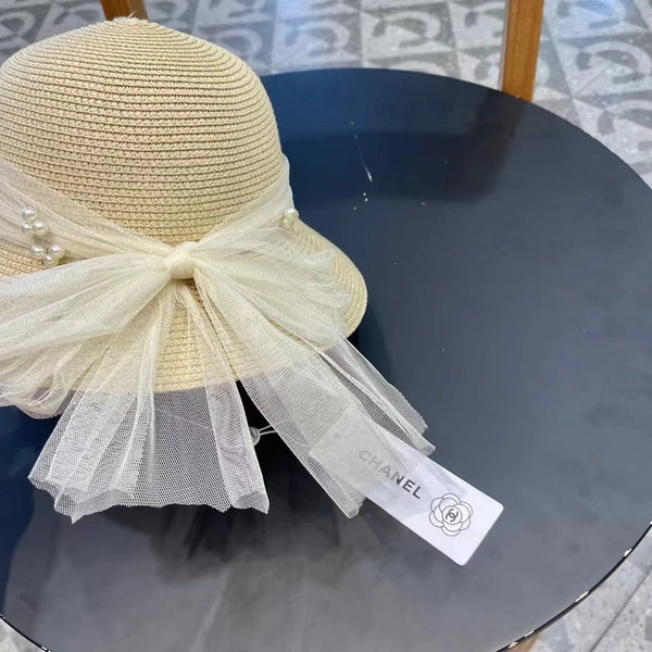 STRAW HAT BOW WITH PEARL IVORY 672698