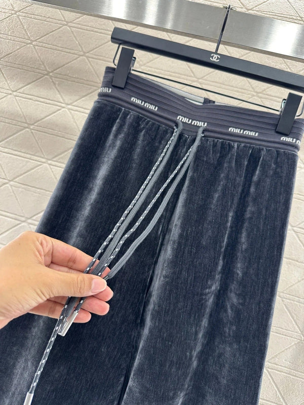 PANTALONI A GAMBA LARGA MIUMIU STILE 118