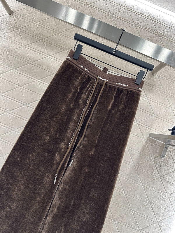 PANTALONI A GAMBA LARGA MIUMIU STILE 119