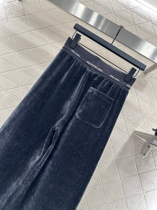 PANTALONI A GAMBA LARGA MIUMIU STILE 118