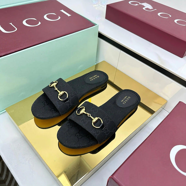 GG SLIDES IN BLACK WITH GOLD HARDWARE