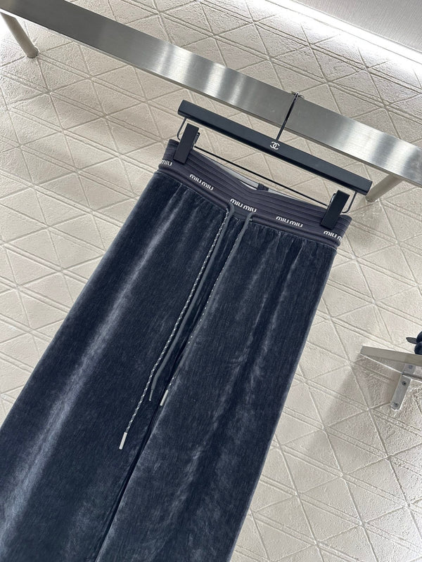 PANTALONI A GAMBA LARGA MIUMIU STILE 118