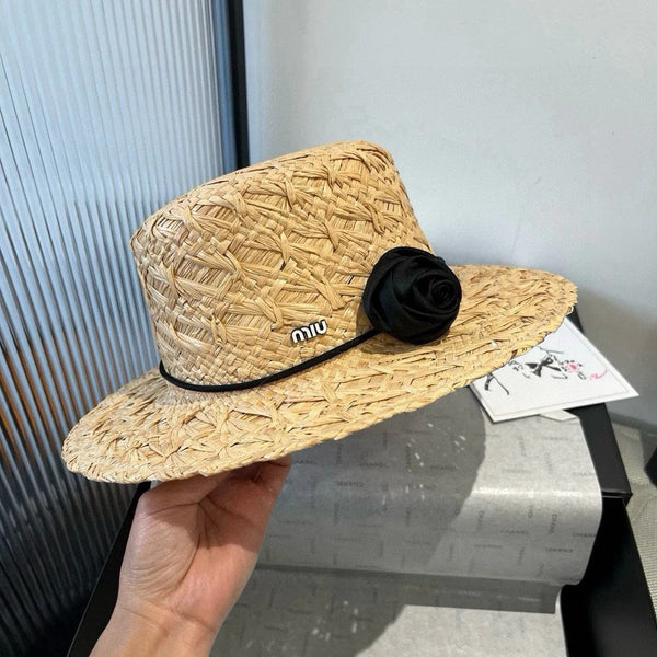 MM STRAW HAT IN BEIGE RAFFIA WITH BLACK FLOWER ACCENT