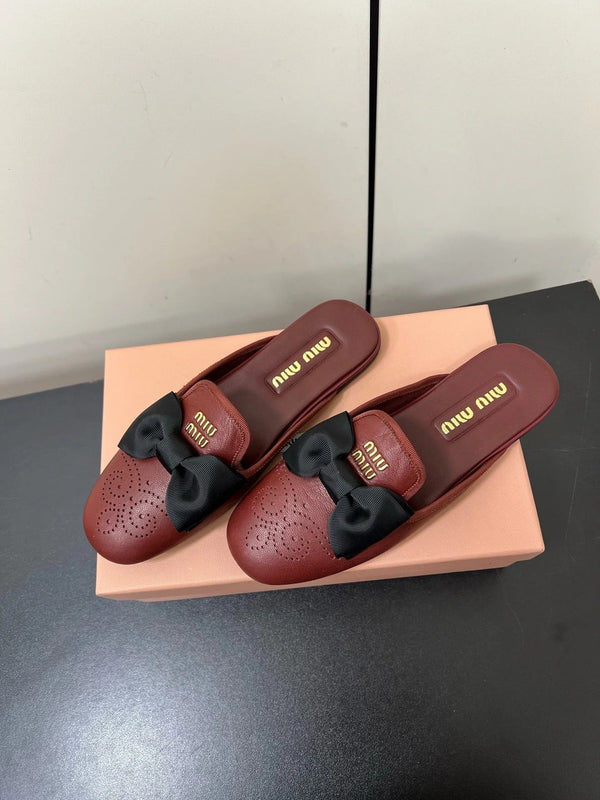 BOW MULES IN RED BROWN SHEEPSKIN