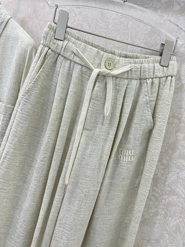 SET CAMICIA E PANTALONI A GAMBA LARGA CHANEL STILE 33