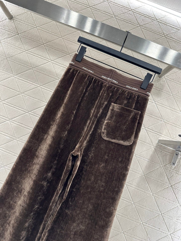 PANTALONI A GAMBA LARGA MIUMIU STILE 119