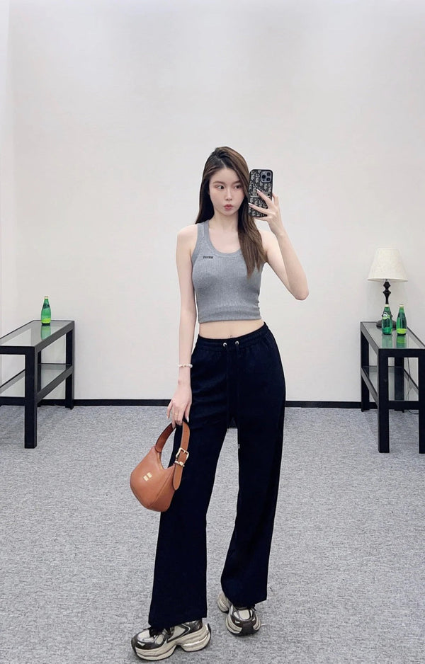 PANTALONI A GAMBA LARGA MIUMIU STYLE 115