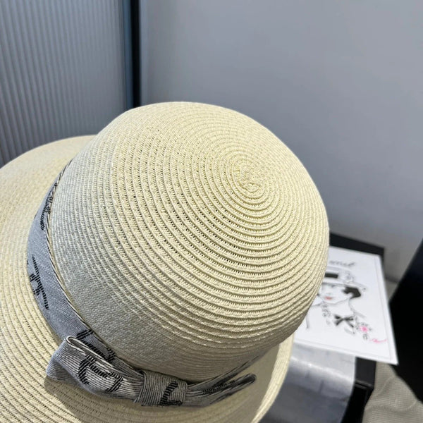 STRAW BUCKET HAT IN IVORY WITH RIBBON BOW 673977