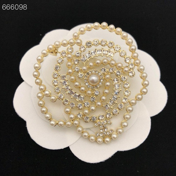 SPILLA A FORMA DI FIOCCO DI NEVE PER LE FESTE IN PERLA BIANCA E CRISTALLO