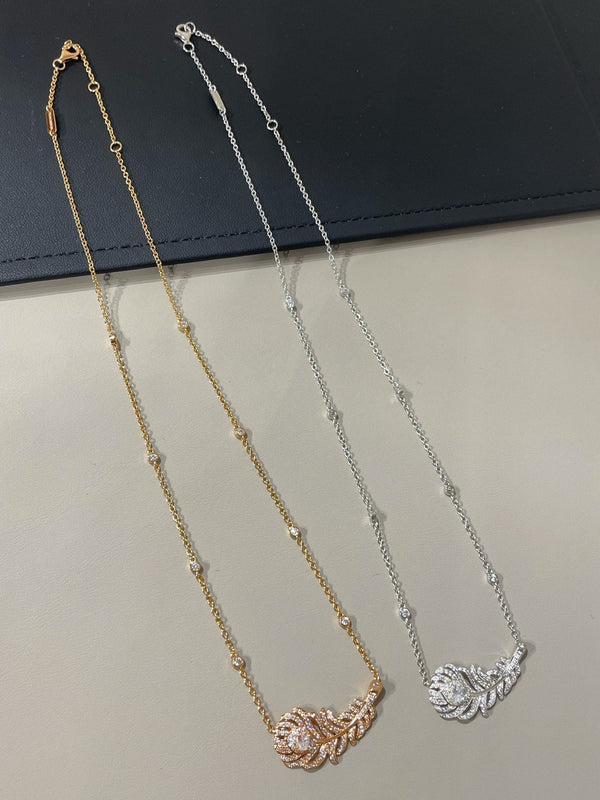 COLLANA CON PIUME DI PAVONE