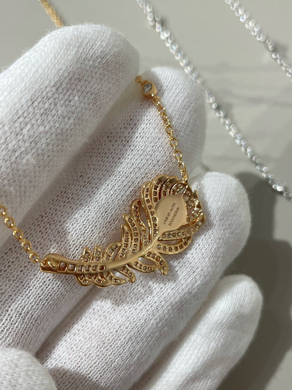 COLLANA CON PIUME DI PAVONE