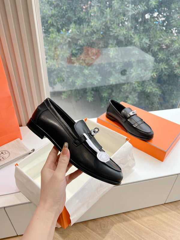 Mocassino Destin in pelle di capra nera con dettaglio frange