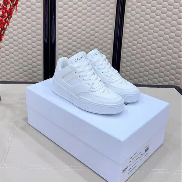 Celin Low Lace-Up Trainers in White PVC Leather