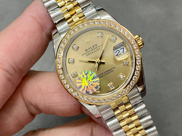 DATEJUST 31MM GOLD STEEL DIAMOND BEZEL YELLOW DIAL