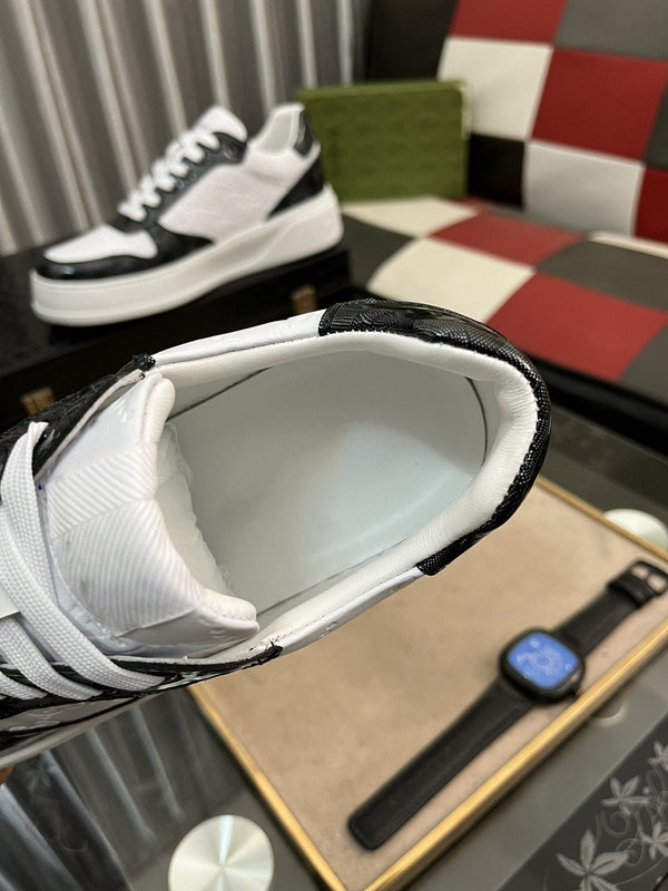 SNEAKERS GG IN PELLE DI VACCHETTA GOFFRATA BIANCA E NERA